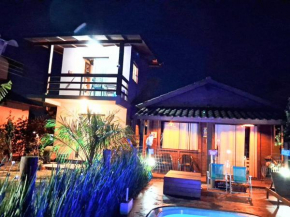 Praia do Rosa loft com cozinha